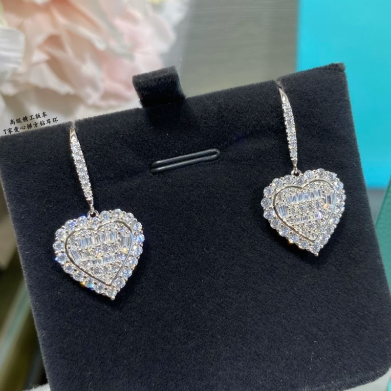 T*f*ny earrings